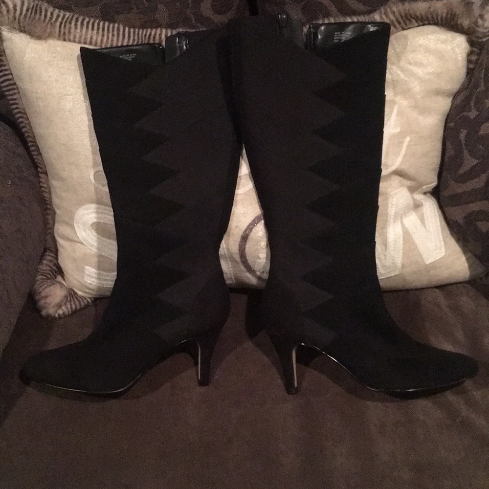 Tall black heeled boots